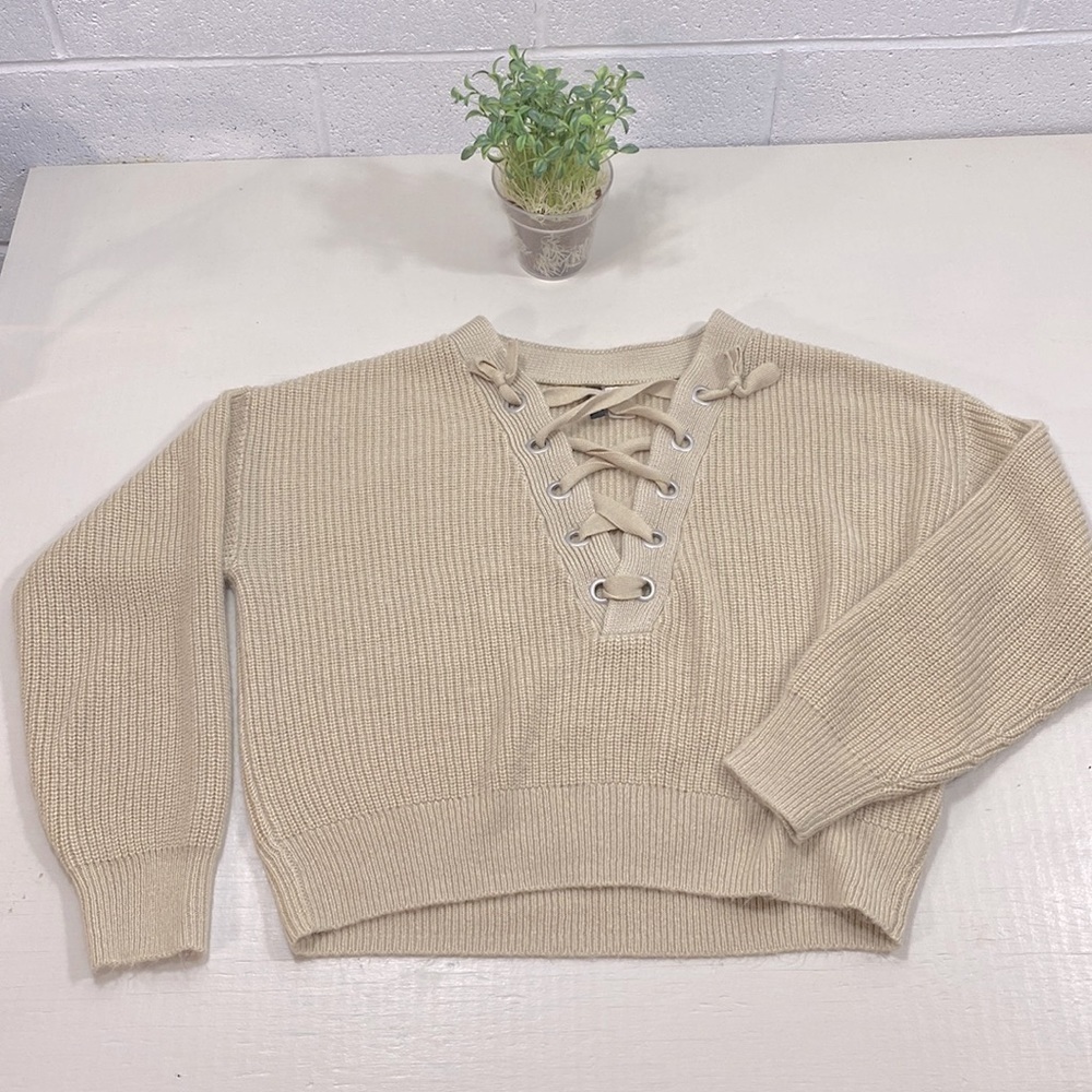 Dividend H&M tan coloured knitted sweater with laced up front​​​​​​​​​​​…​​
